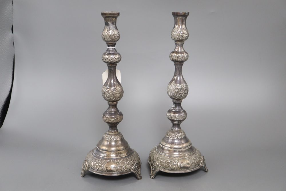 A pair of George V silver Sabbath Day candlesticks by J. Zeving, London, 1920, 30.2cm, weighted, no sconces.